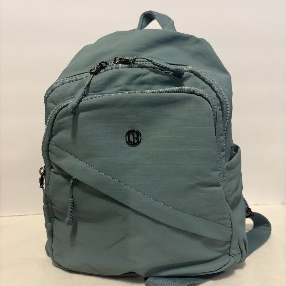 Teal Backpack With Multiple Compartments - image 1